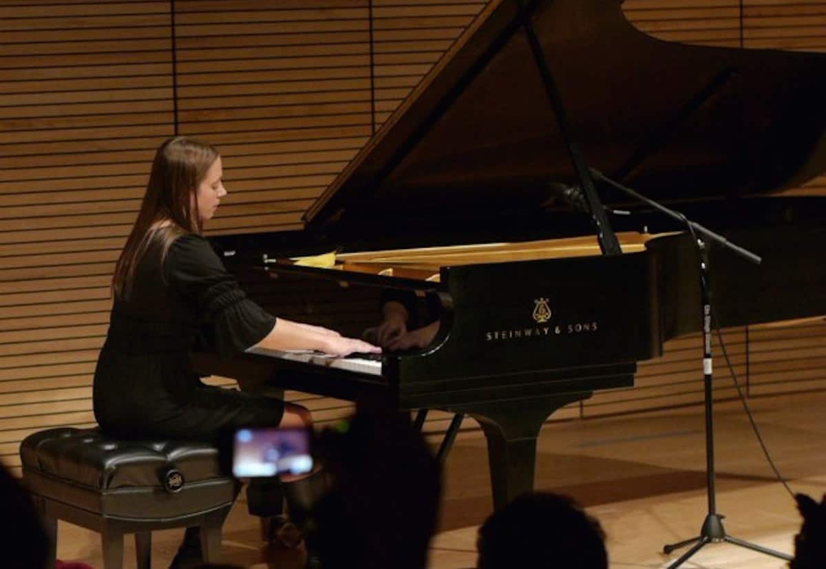Kirsten Volness playing piano | Photo courtesy of Kirsten Volness