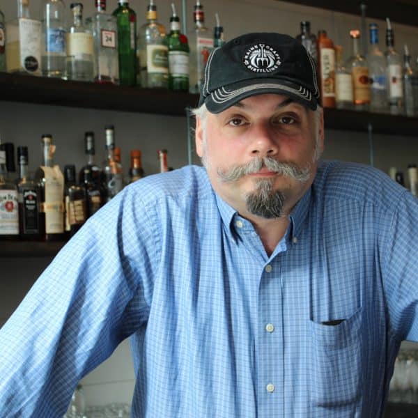 Portland bartender John Myers calls himself a "frustrated librarian and latent hoarder" | Photo by Tom Minervino