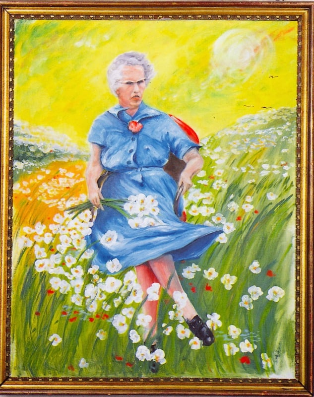 LUCY IN THE FIELD WITH FLOWERS