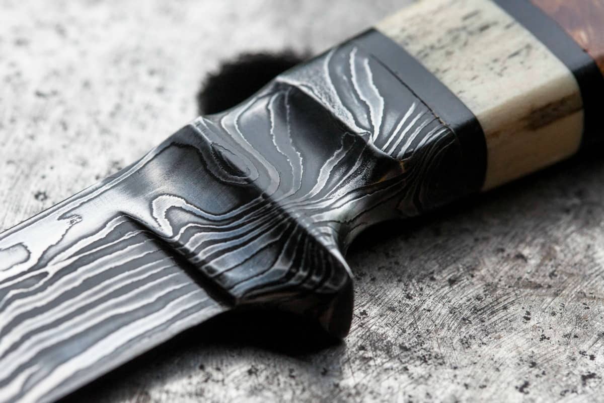 A close look at one of knife maker Nick Anger's Damascus steel blades. Photo by Scott Pasfield