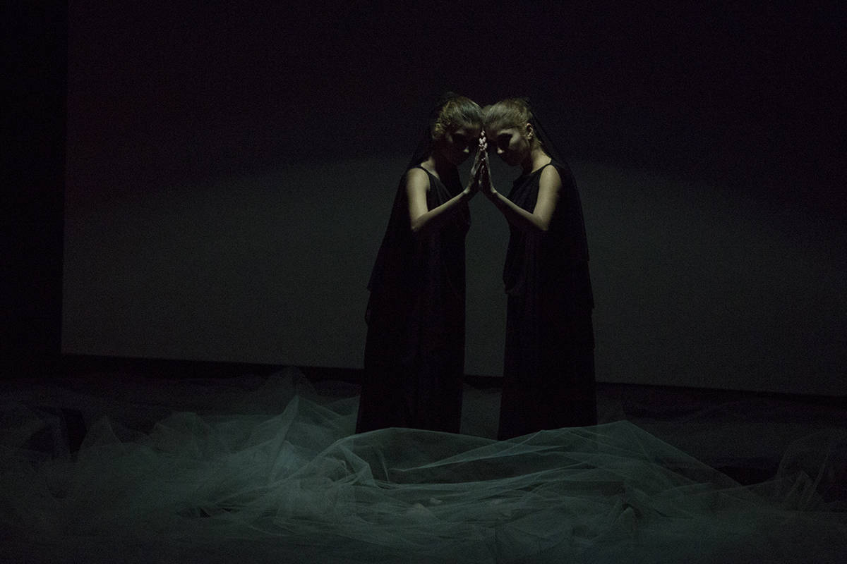 Artists to Watch: Farzaneh and Bahareh Safarani, a still from Cocoon, performed at the Boston Center for the Arts, 2015. Photo by Hannah Bates